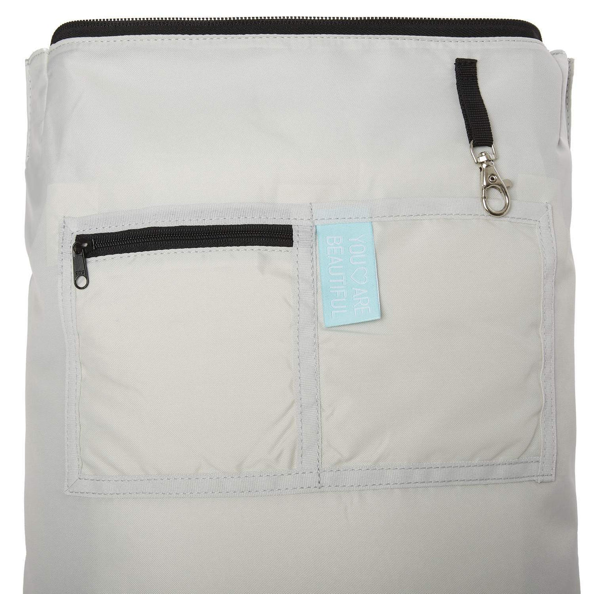 Ela Mo™ Daypack Rucksack | Papercut Tulip. Innenbereich des Rucksacks mit Fächern und Schlüsselanhänger.