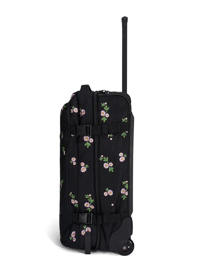 Ela Mo™ Reisetasche mit Rollen 78 Liter | Embroidery Edition Upsy Daisy. Seitenansicht der schwarzen, geblümten Tasche.