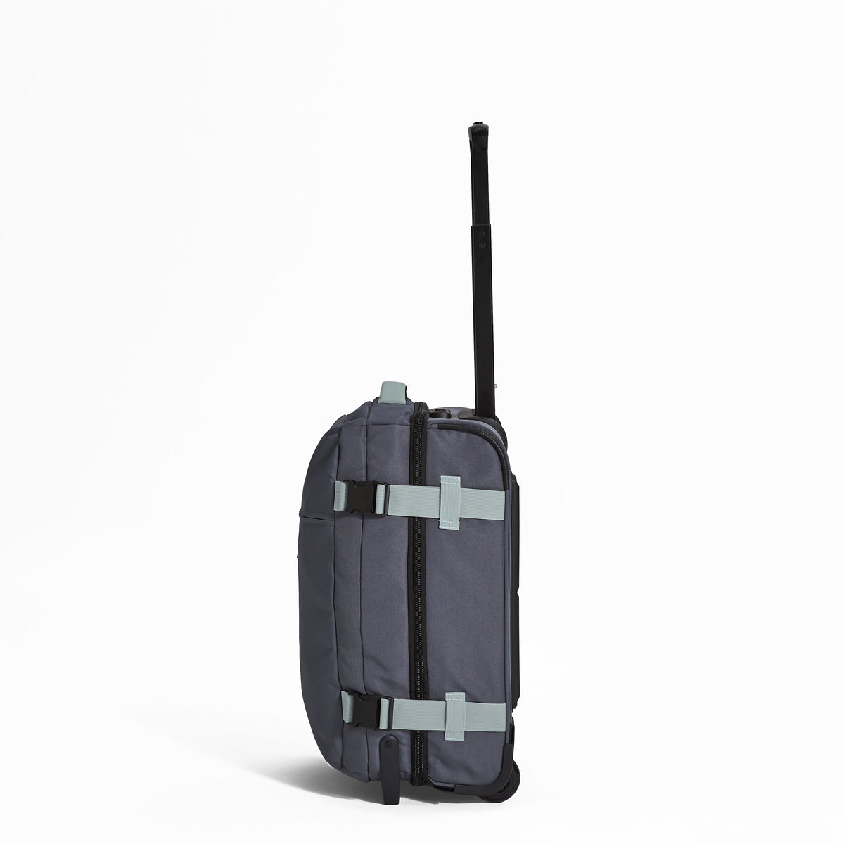 Ela Mo™ Reisetasche mit Rollen 42 Liter | Darkgrey Mint. Reisetasche mit Klickverschluss von der linken Seite.