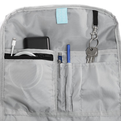 Ela Mo™ Rolltop Rucksack | Salmon. Innenbereich des Rucksacks mit separatem Laptop- und Tablet-Fach.